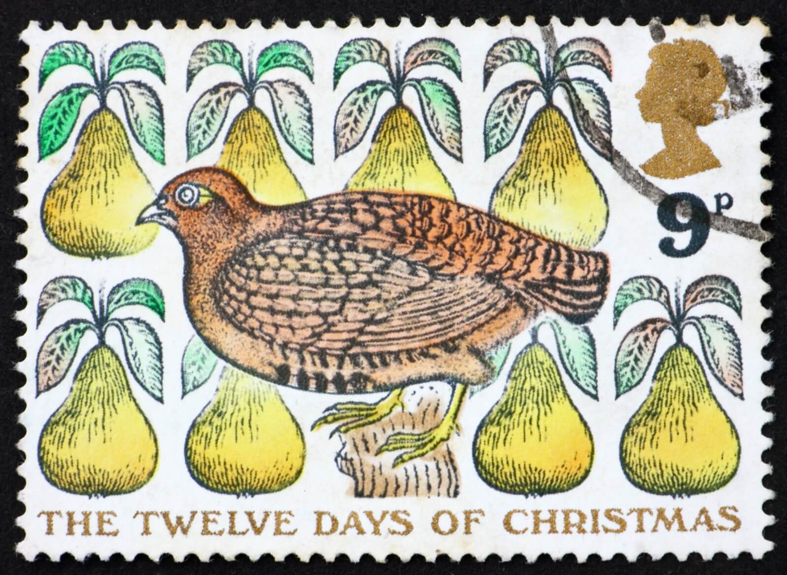 British Postage Stamp “The Twelve Days of Christmas” with a Partridge in a Pear Tree